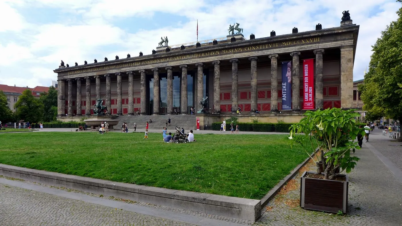 The Altes Museum with its row of Ionic columns above the steps, seen across the lawn of the Lustgarten