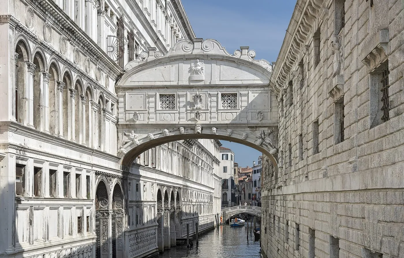 The Bridge of Sighs, a closed white stone bridge across a narrow canal