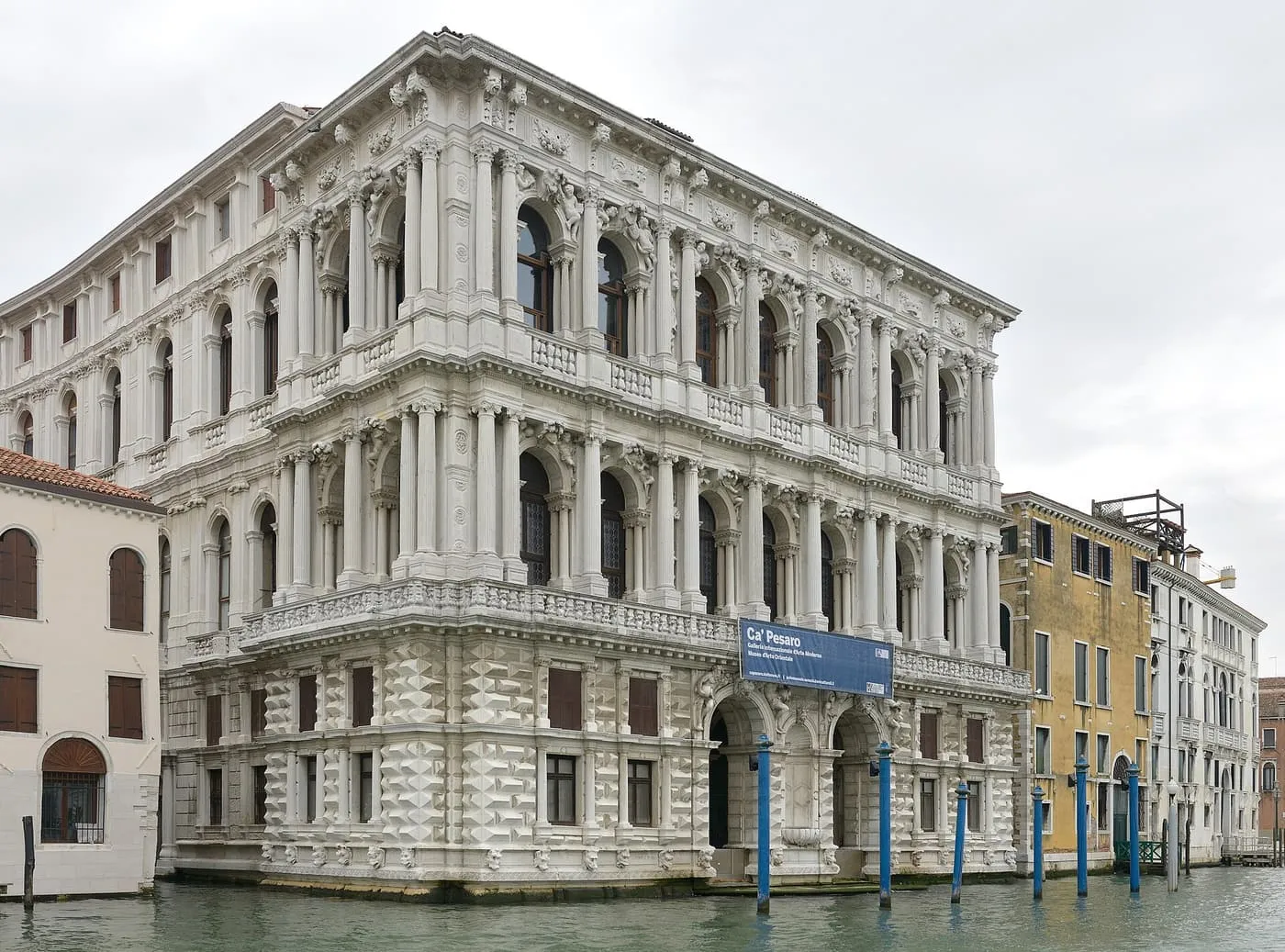The rusticated stone front of Ca' Pesaro on the Grand Canal