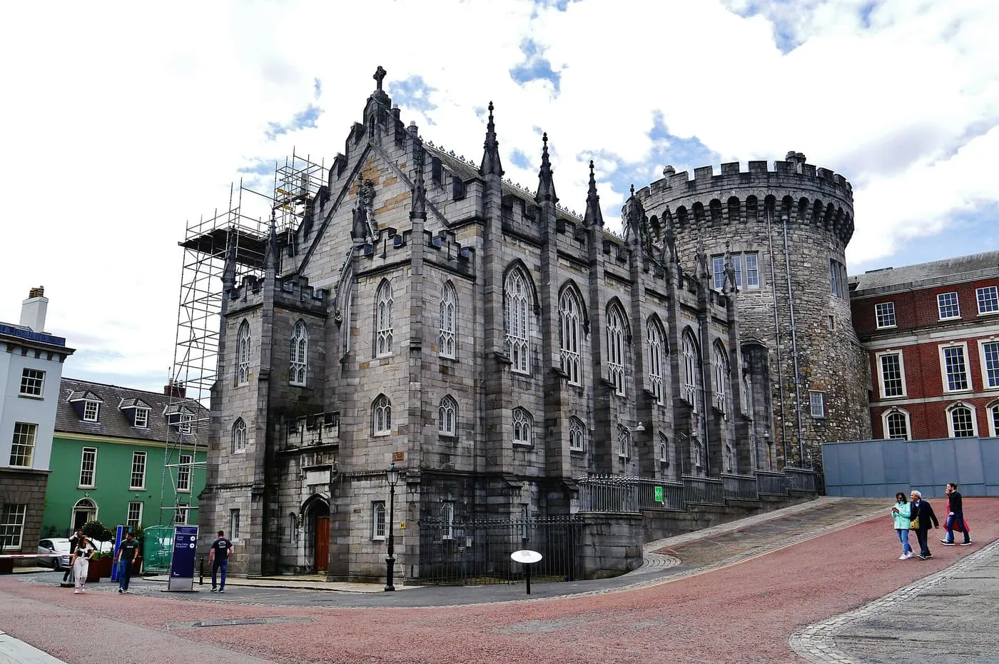 The grey Gothic limestone front of the Chapel Royal at Dublin Castle, with the round battlemented Record Tower rising behind it