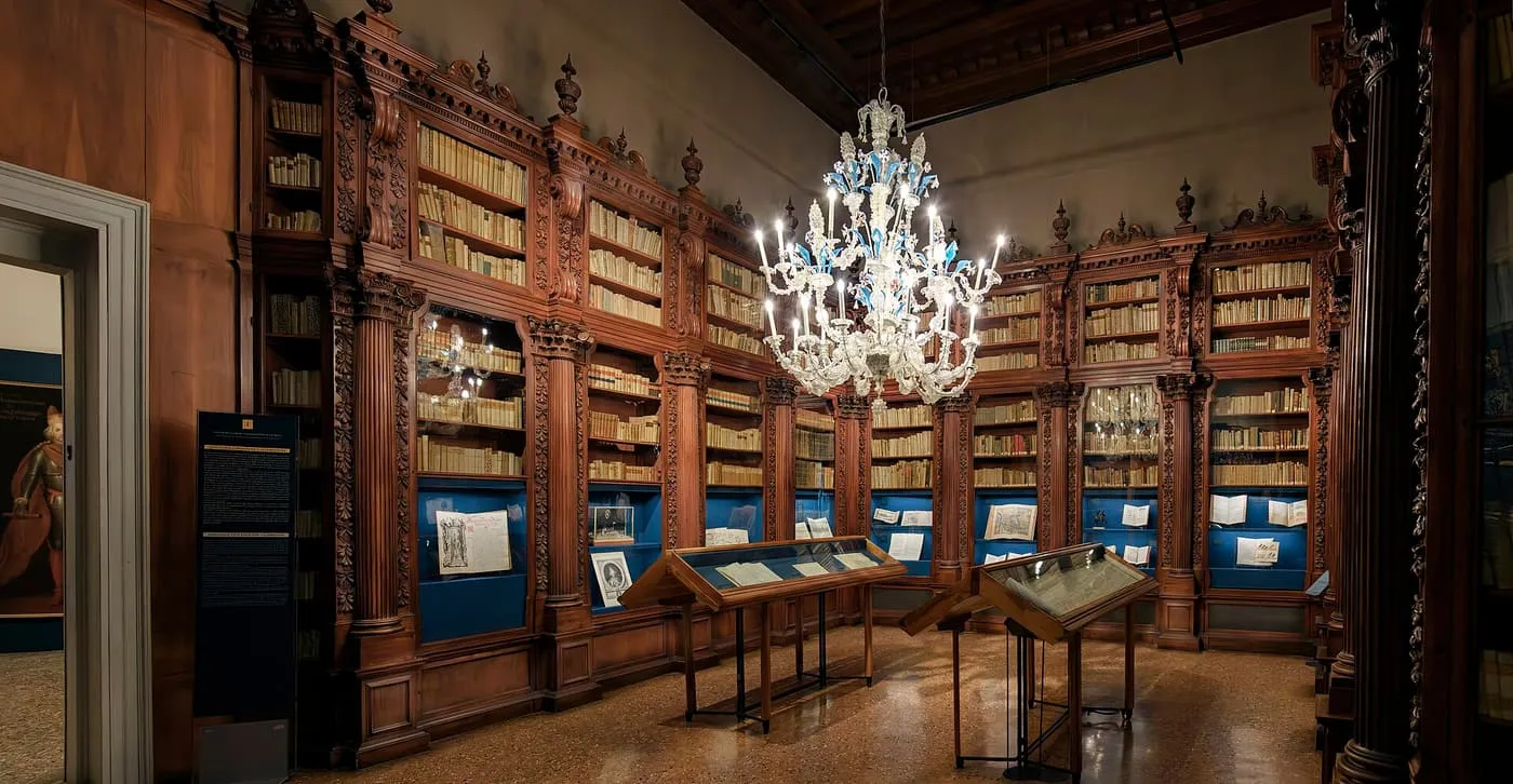 A panelled library room in the Museo Correr with a glass chandelier