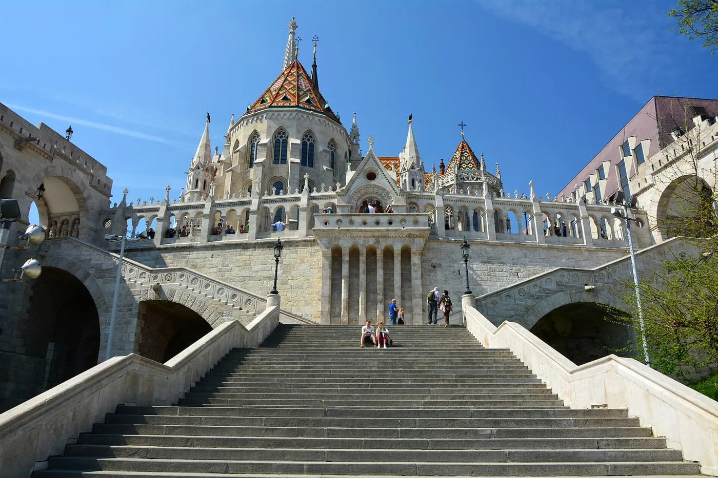 The stone stairway up to Fisherman's Bastion, with the tiled roof of Matthias Church behind