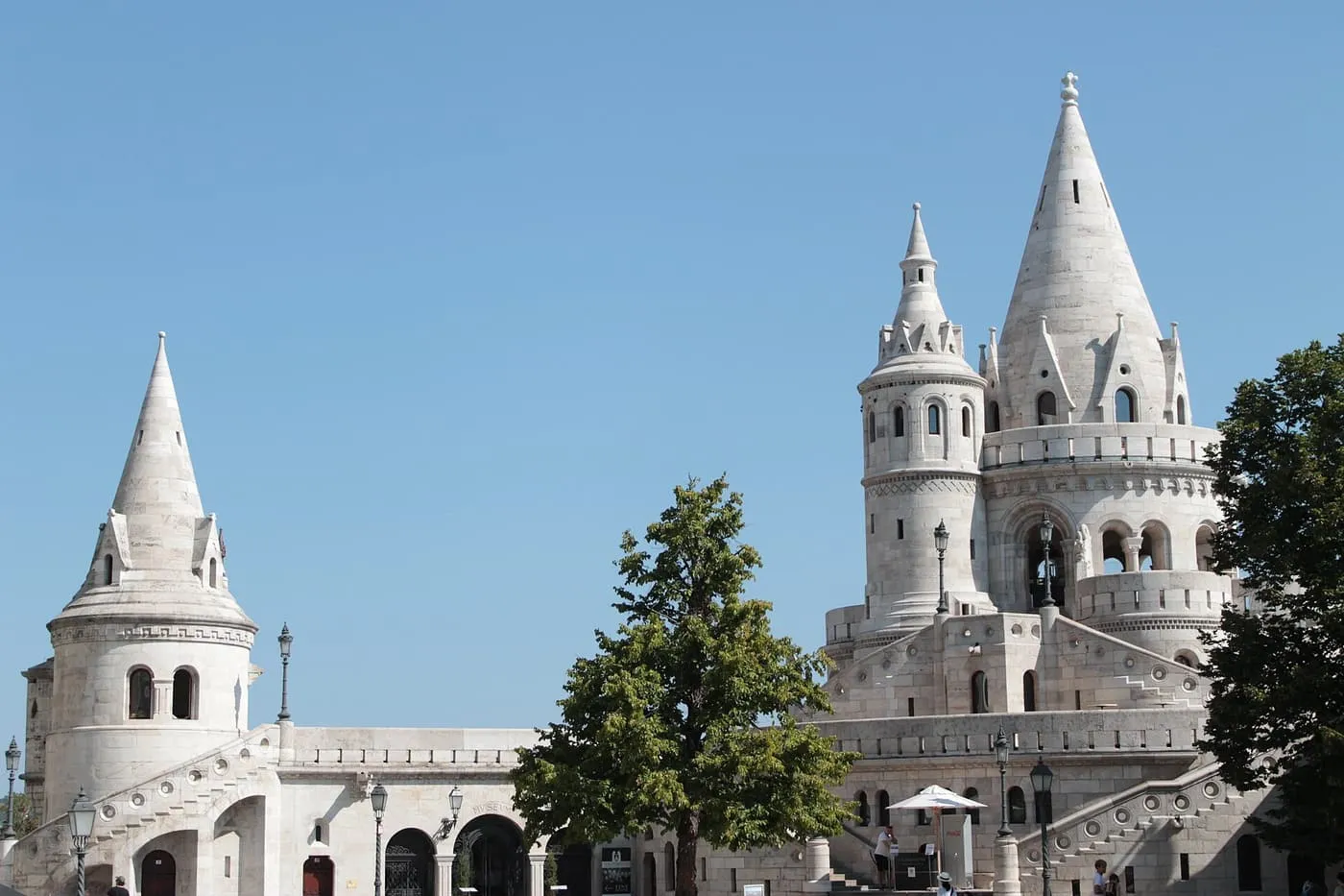 The white conical towers of Fisherman's Bastion under a blue sky