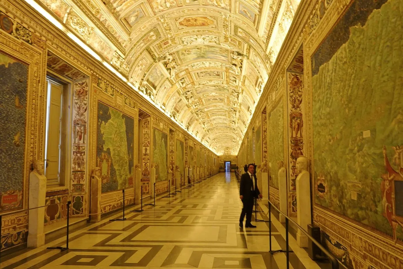 The Gallery of Maps in the Vatican Museums, with painted maps on the walls and a gilded, painted vaulted ceiling
