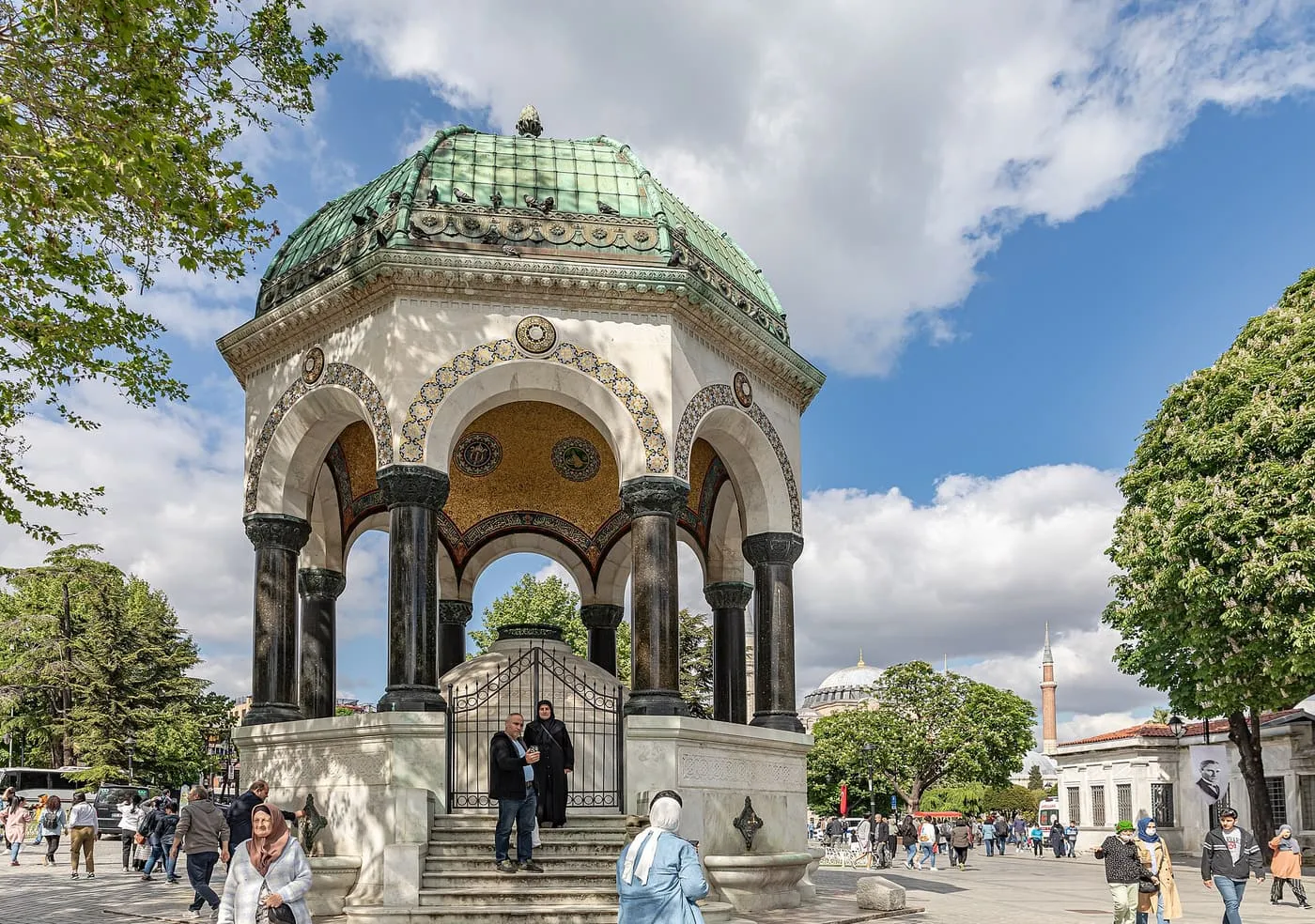 The German Fountain, an octagonal domed pavilion with a green roof and gilded mosaic ceiling, in Sultanahmet Square