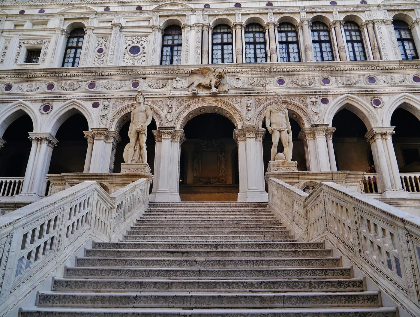 The Giants' Staircase in the courtyard, with the statues of Mars and Neptune at the top