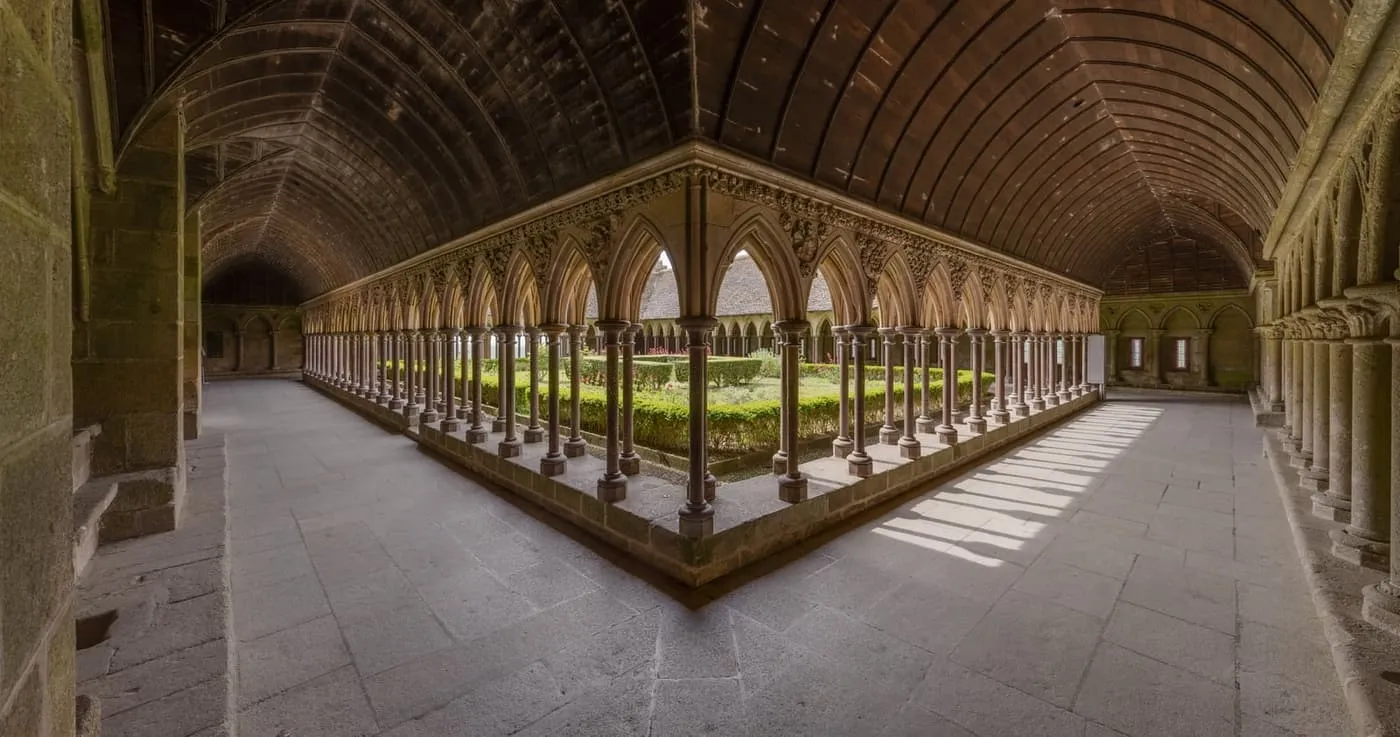 The arcaded cloister of Mont-Saint-Michel abbey around its square garden