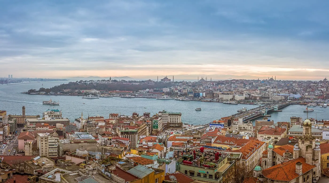 The old city peninsula across the Golden Horn from the Galata Tower, with Topkapı Palace, Hagia Sophia and the Blue Mosque on the skyline and the Galata Bridge at right