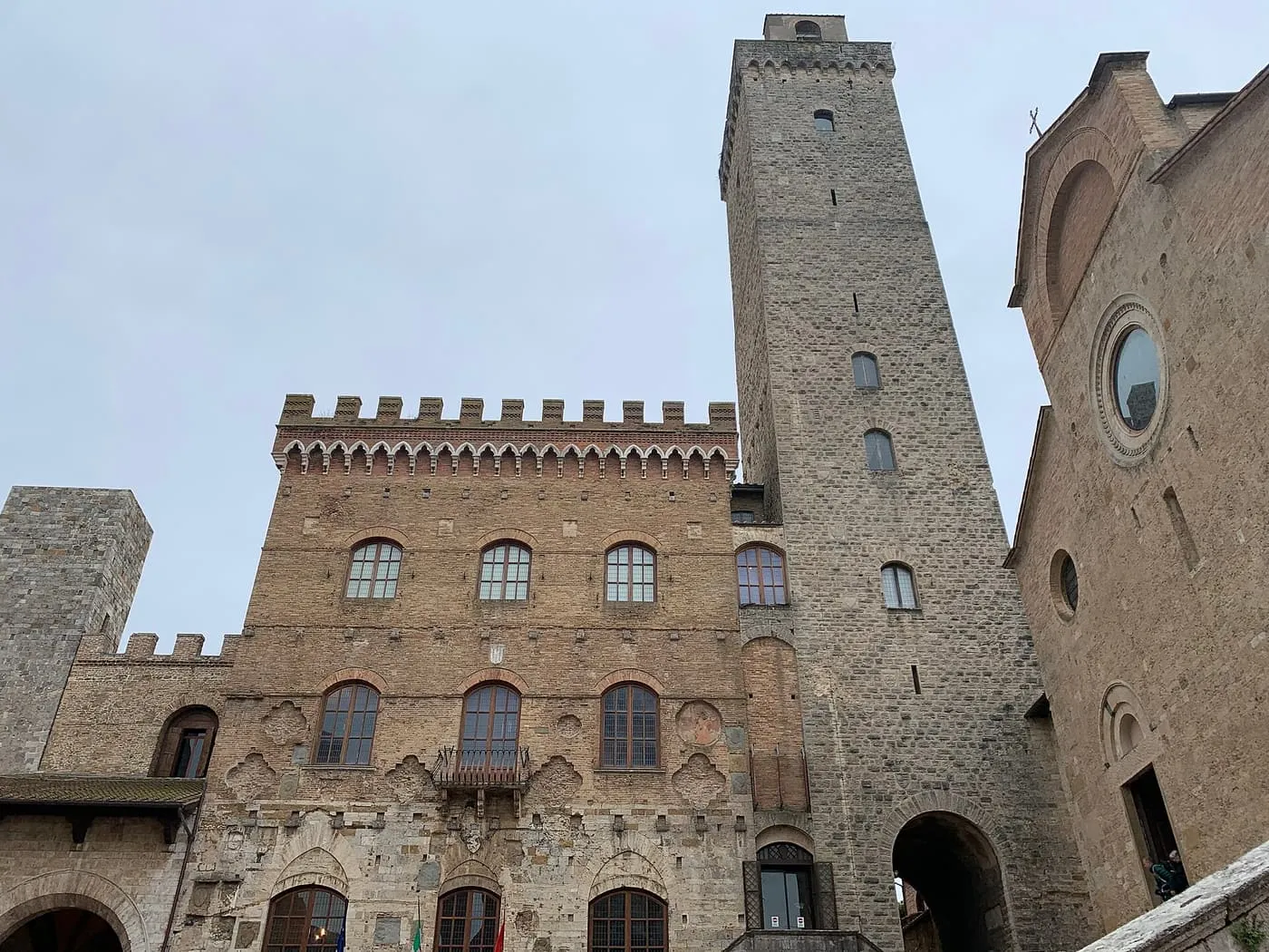 The crenellated Palazzo Comunale with the tall Torre Grossa rising behind it