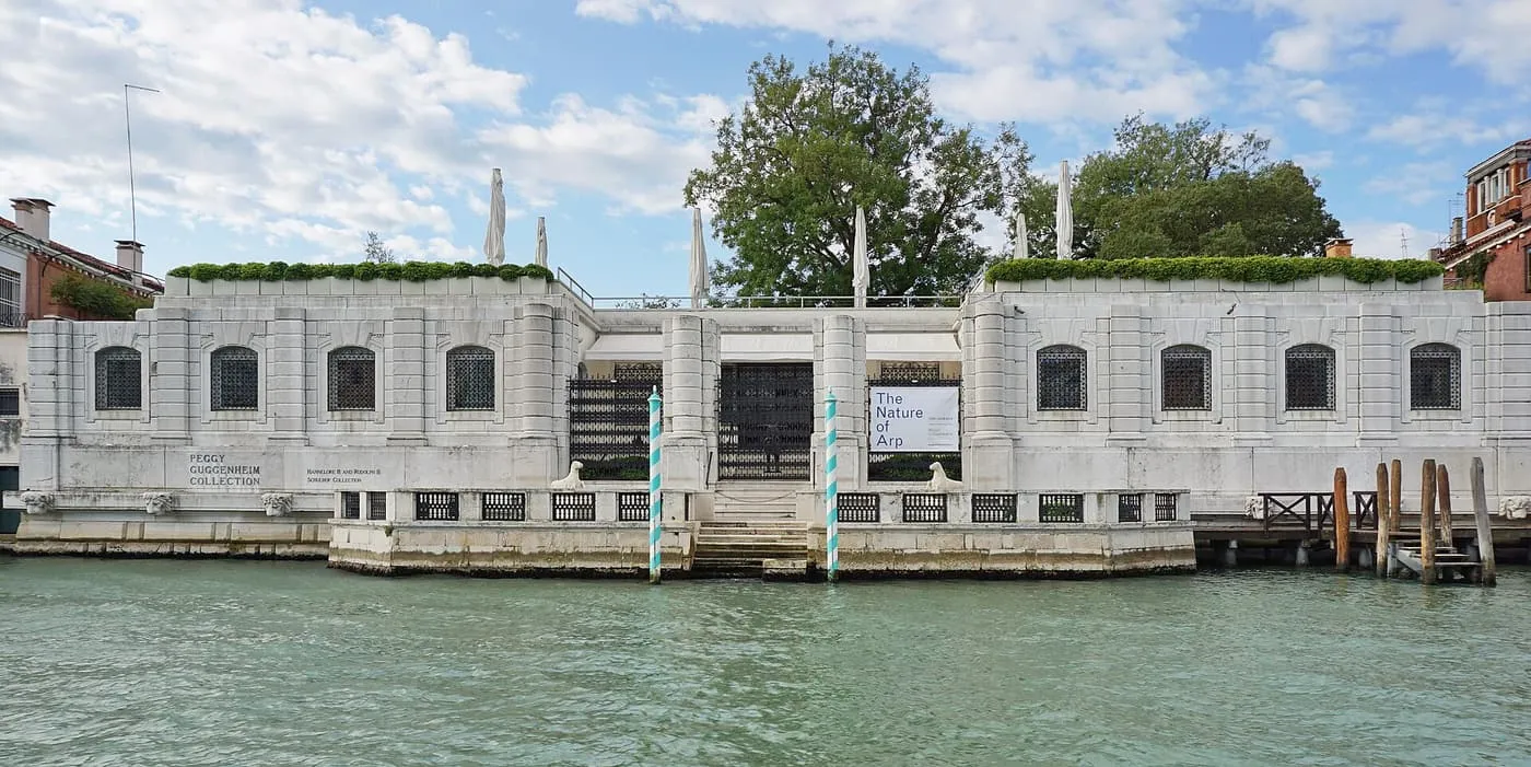 The low white front of the Peggy Guggenheim Collection on the Grand Canal