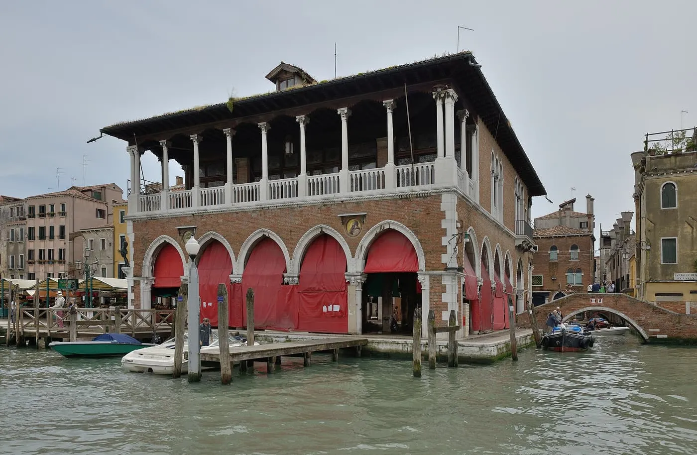 The Pescheria, a brick market building with a pillared upper loggia, beside the Grand Canal