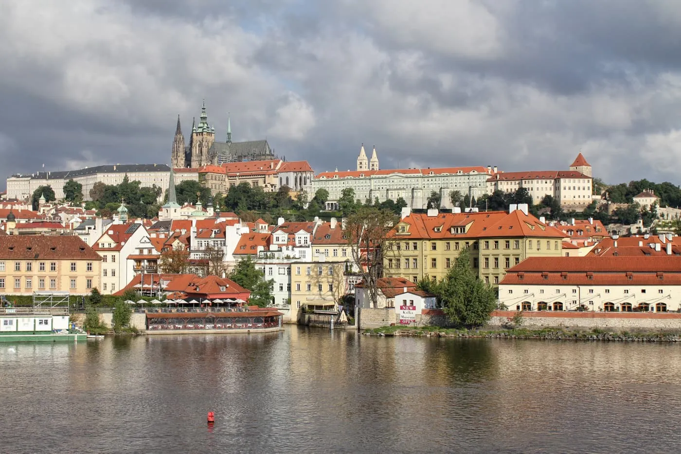 St Vitus Cathedral and the Castle buildings on the hill above the red roofs of Malá Strana, seen across the Vltava