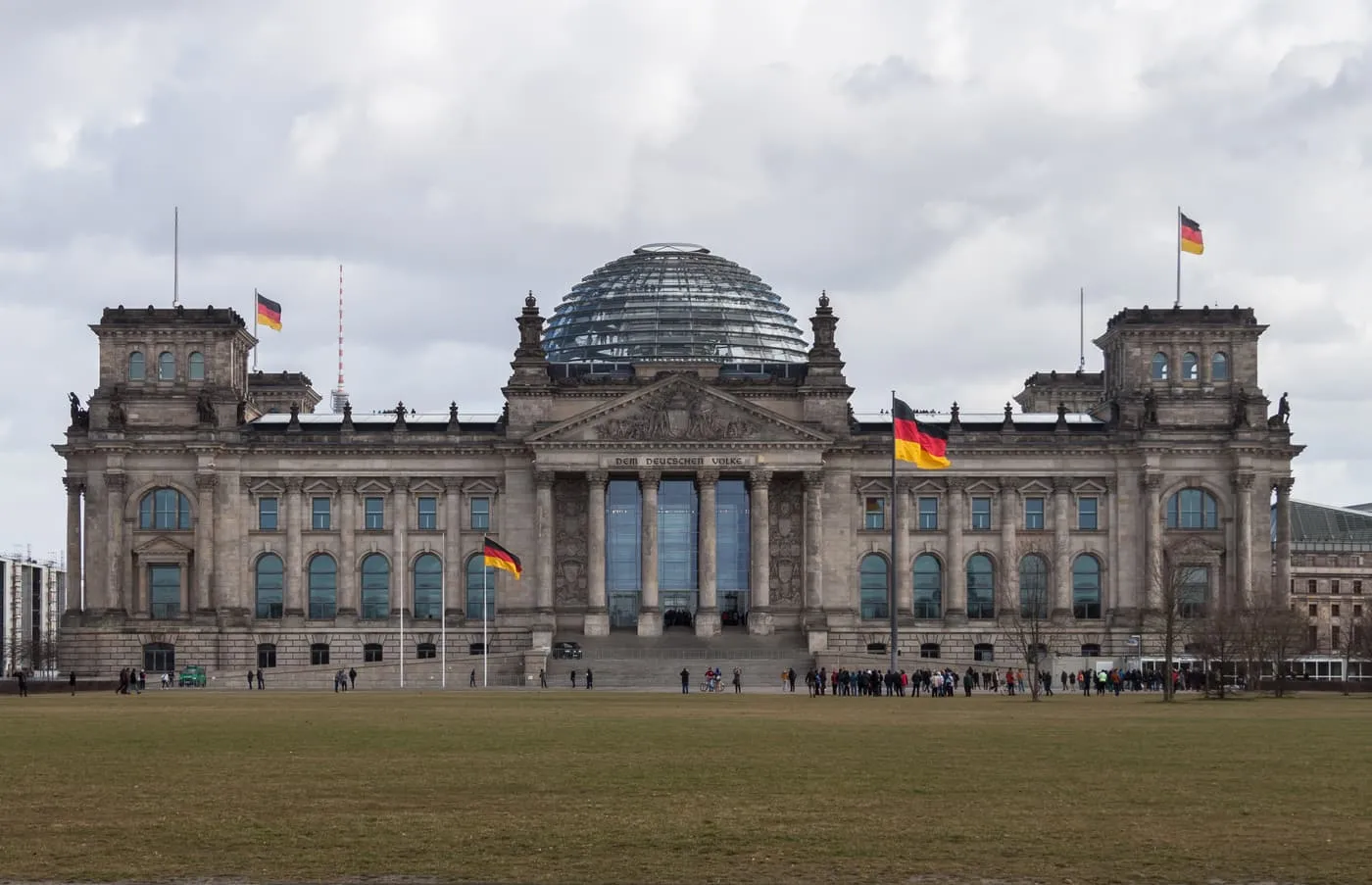 The west front of the Reichstag with its glass dome, seen across the lawn of Platz der Republik