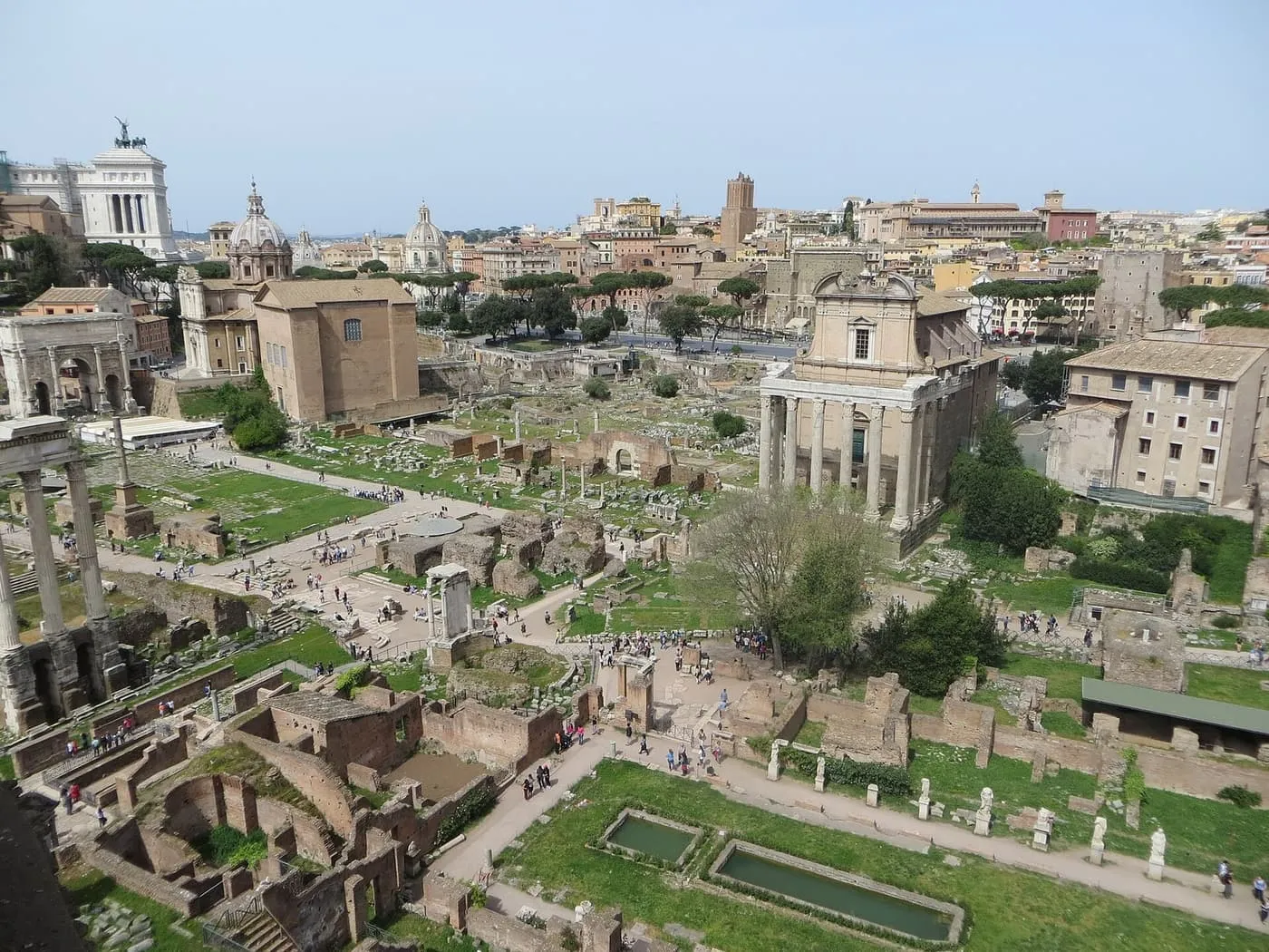 The ruins of the Roman Forum seen from the Palatine, with the Temple of Antoninus and Faustina, the Curia and the Vittoriano beyond