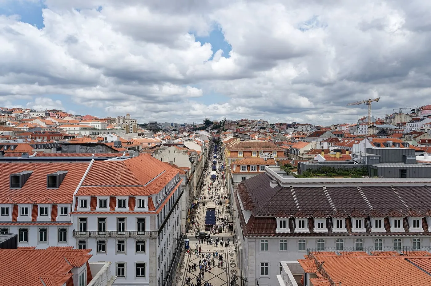 Rua Augusta, the pedestrian street of Baixa, seen from above with its patterned pavement and terracotta roofs