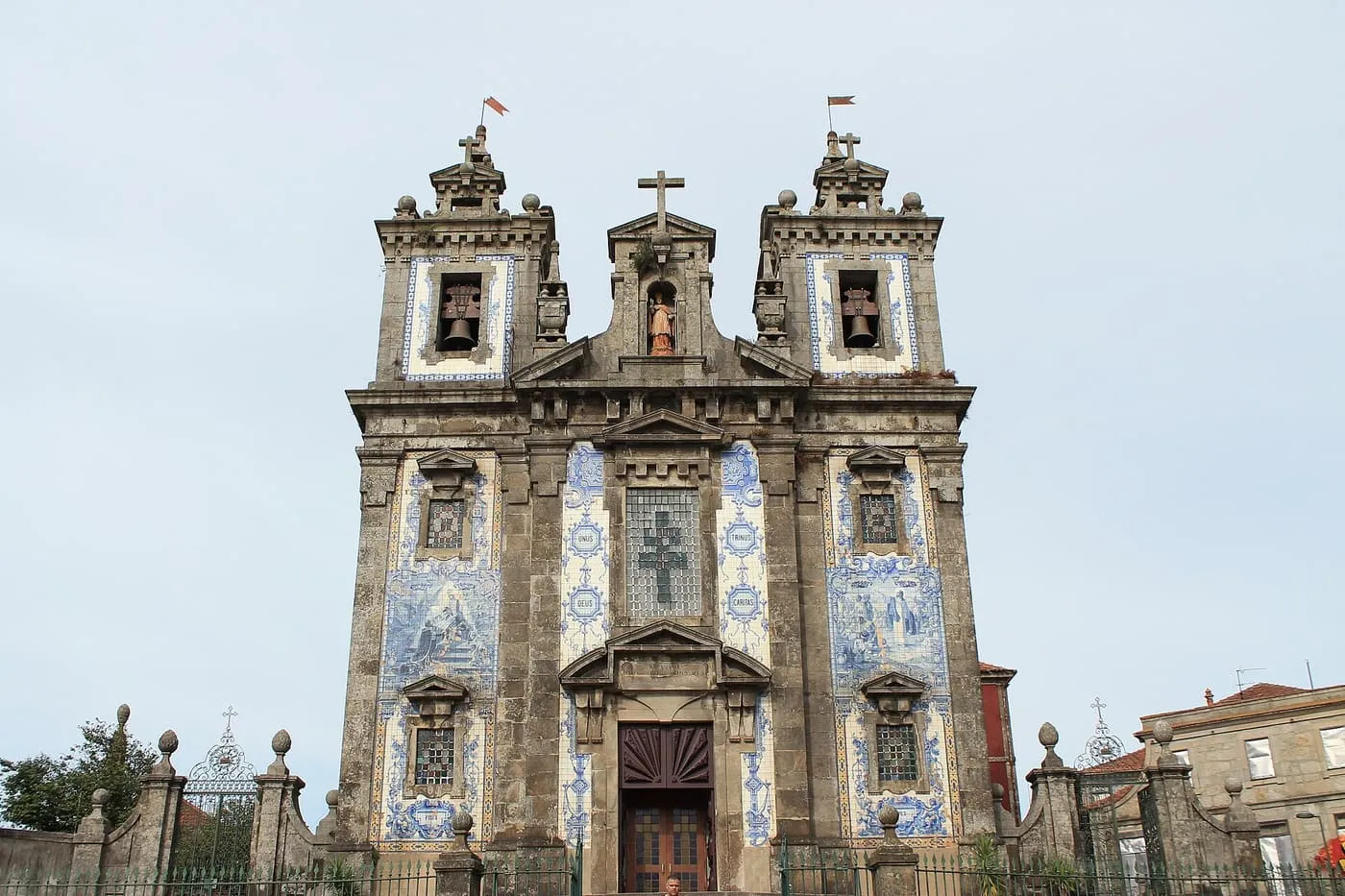 The twin-towered front of the Igreja de Santo Ildefonso, covered in blue-and-white tile panels