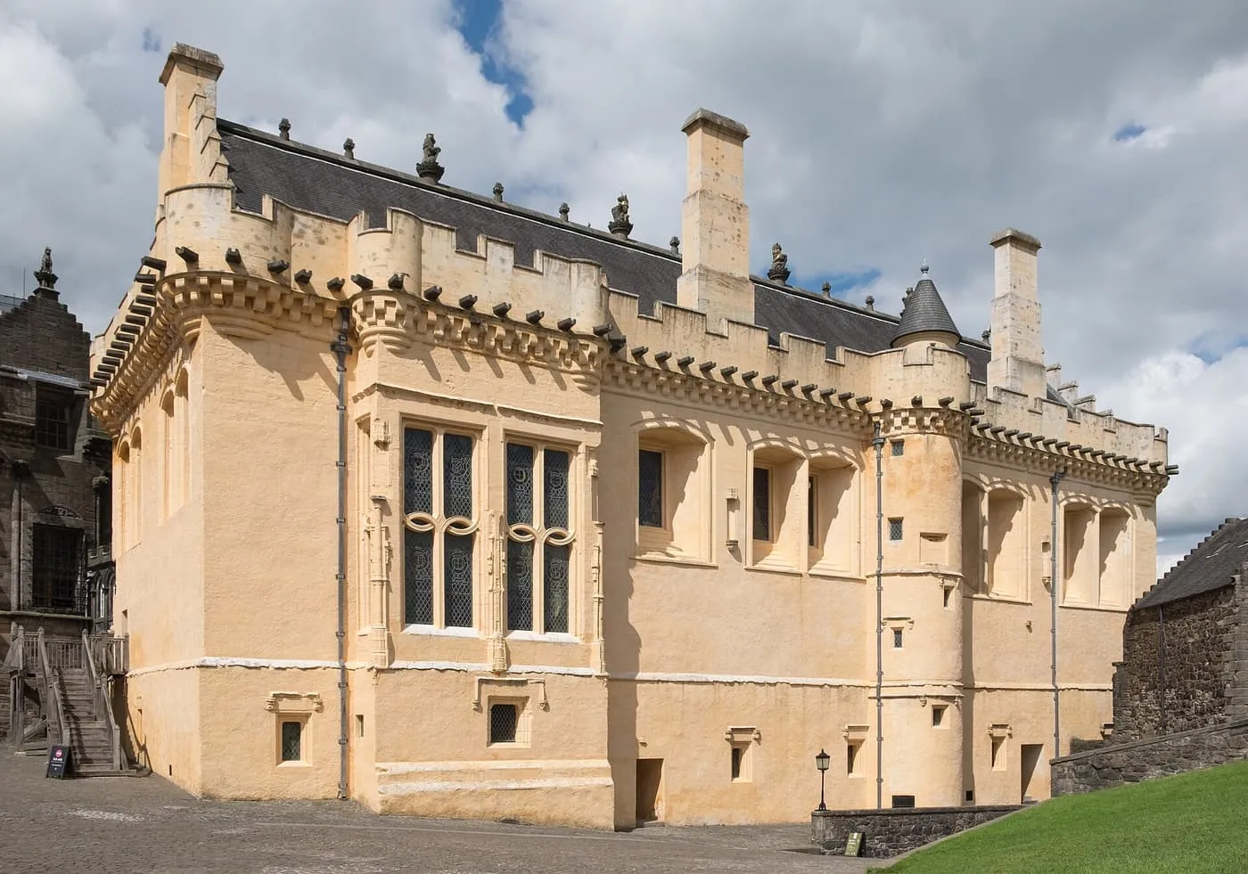 The cream-harled Great Hall at Stirling Castle with its battlemented parapet and tall chimneys