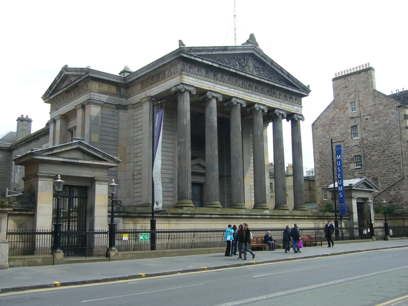 The columned stone front of Surgeons' Hall on Nicolson Street, seen across the road