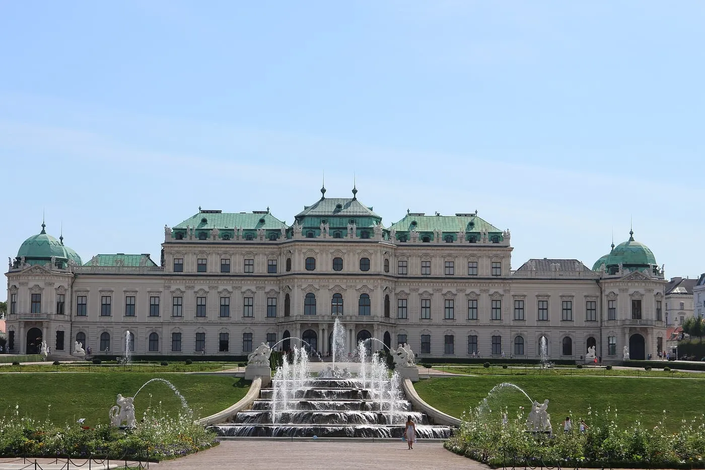 The Upper Belvedere, a pale Baroque palace with green copper roofs, behind a cascade of fountains and lawns