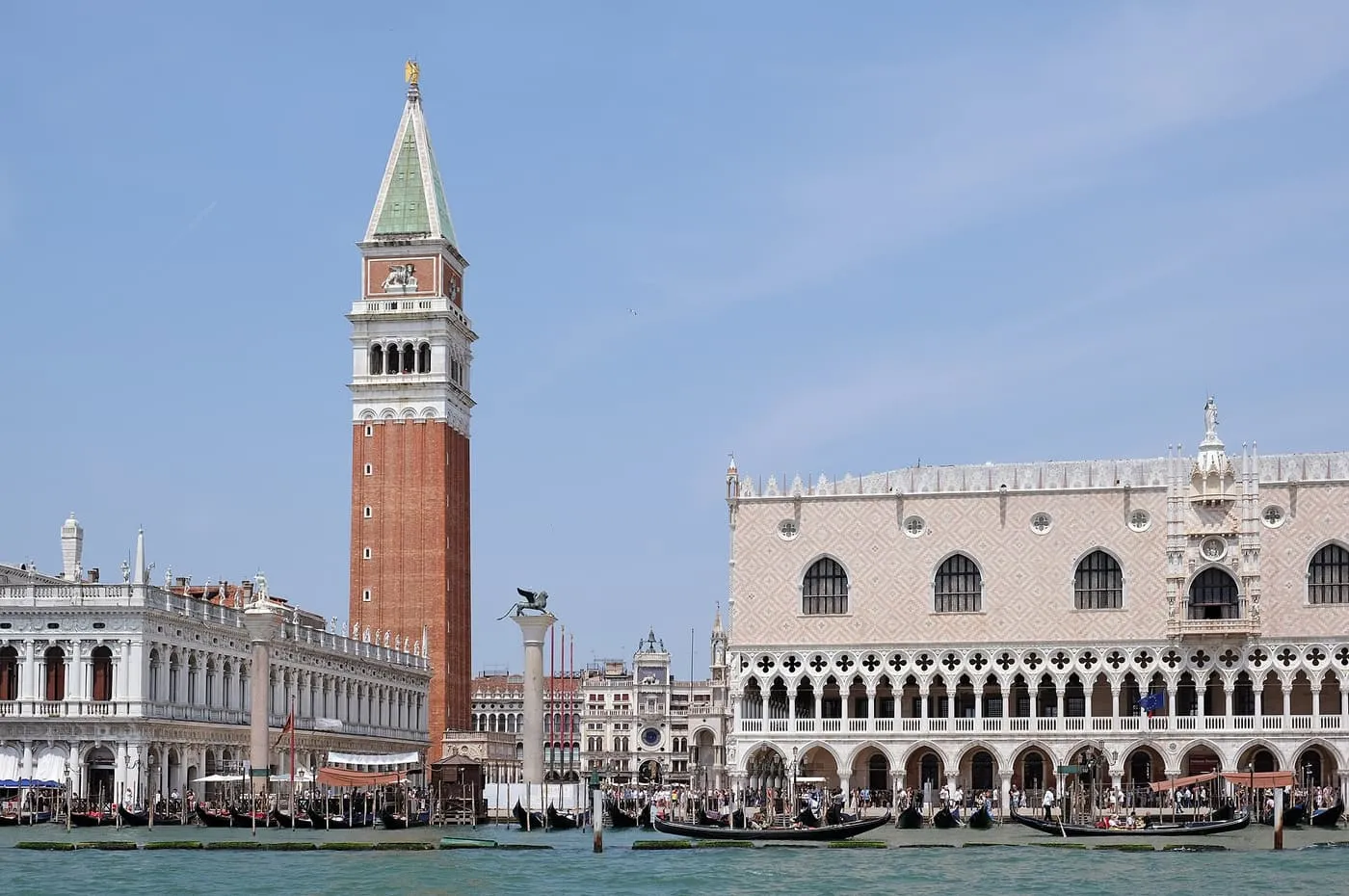 The Campanile and the Doge's Palace on the Venice waterfront, seen across the water with gondolas moored below