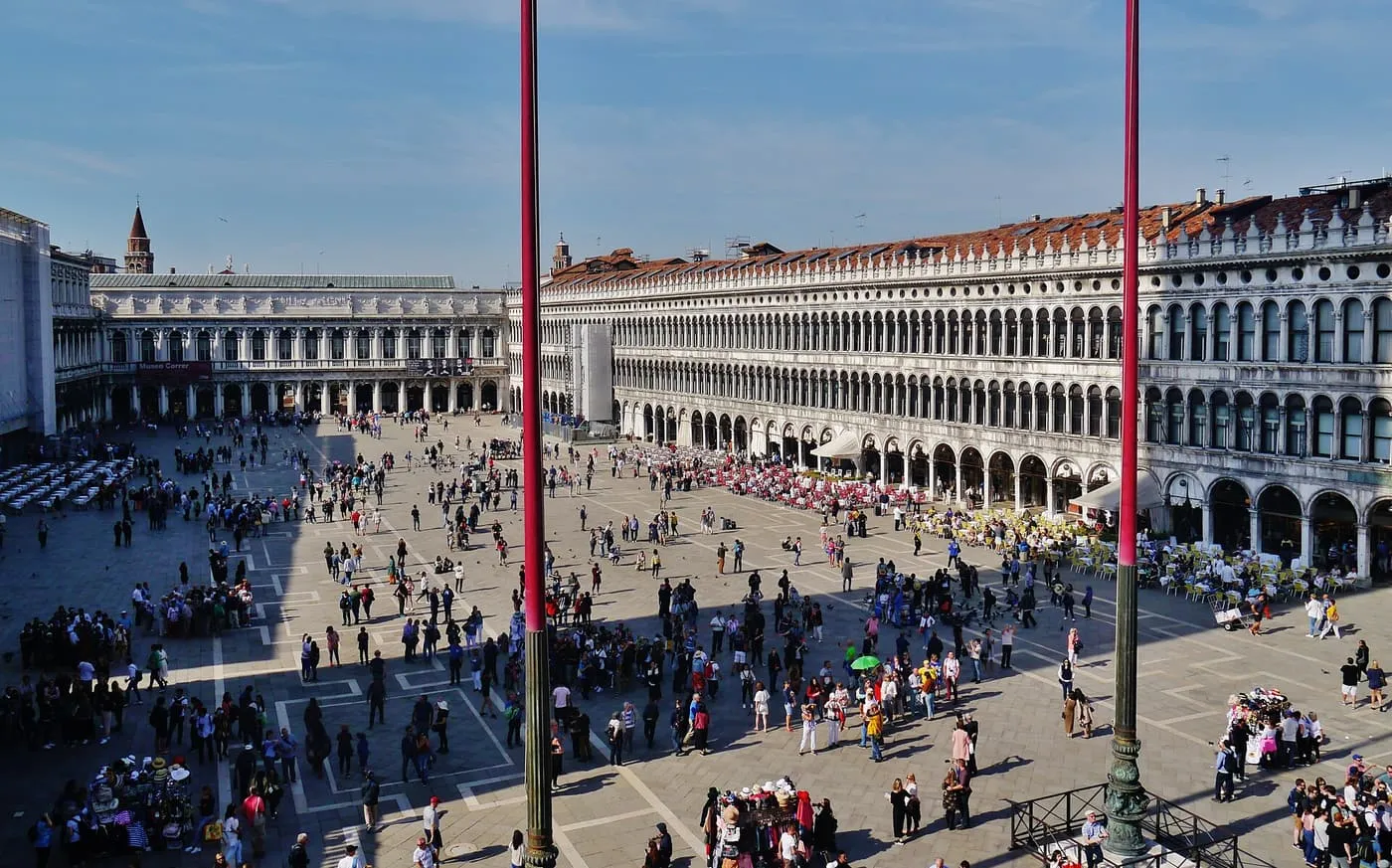 The Square seen from the Basilica terrace, with two red flagpoles in front
