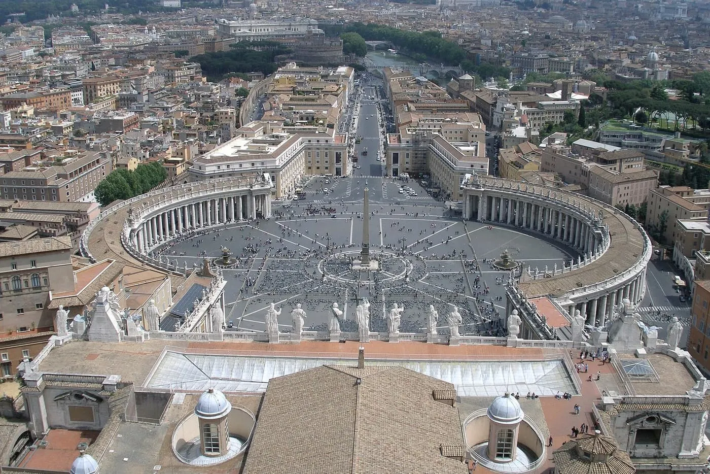 St Peter's Square from the top of the dome, with the two arms of the colonnade, the obelisk and Via della Conciliazione, and Castel Sant'Angelo beyond