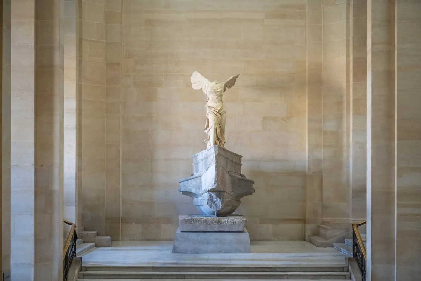 The Winged Victory of Samothrace on its ship's-prow base at the top of the Daru staircase