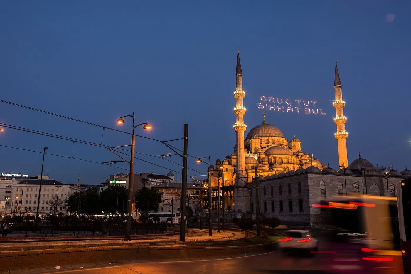 The Yeni Cami at Eminönü at night, with a mahya of lights between its two minarets